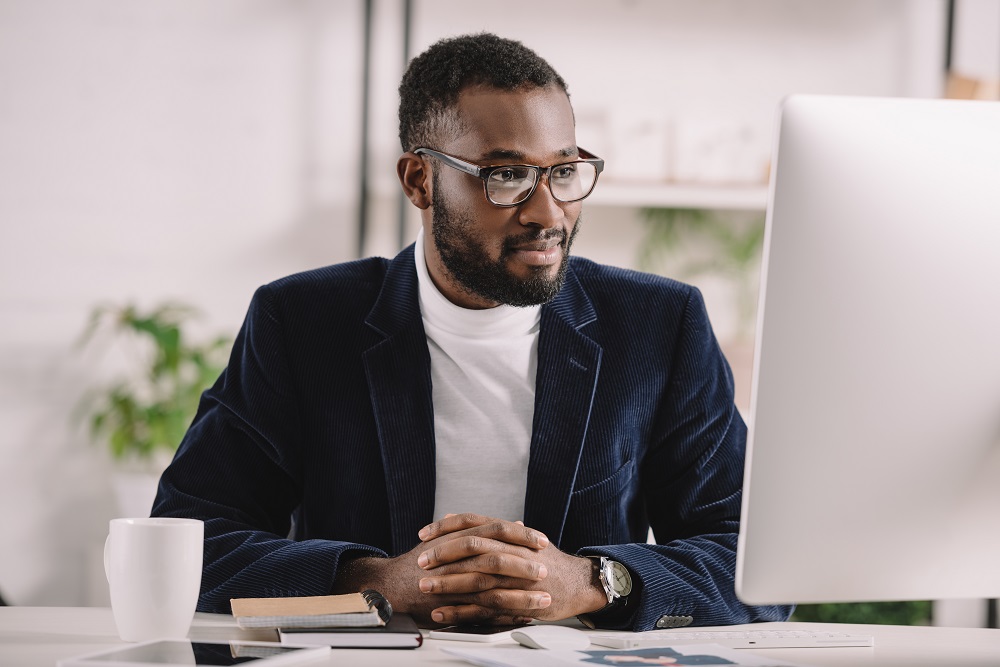 Man looking at computer screen